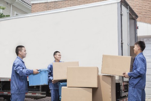 Professional office movers handling desk setup in Storage Fulham