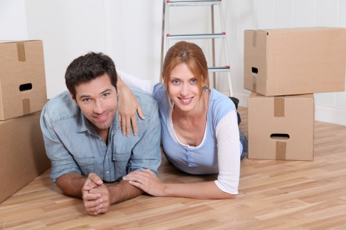 IT professionals setting up technology in a relocated office